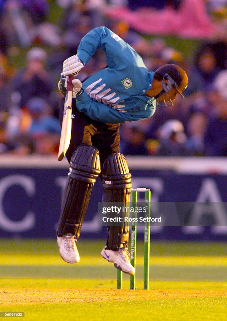 New Zealand's Stephen Fleming airborne against the