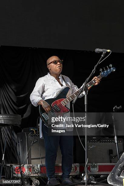 American musician Meshell Ndegeocello plays bass as she performs onstage with her band during the Blue Note Jazz Festival at Central Park...