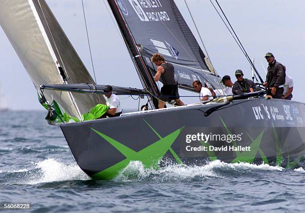 Paul Cayard, left at the helm of AmericaOne in the first race of the Louis Vuitton Cup finals against Prada on the Hauraki Gulf, Auckland, Wednesday....