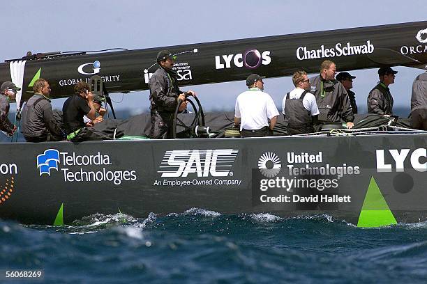 Skipper Paul Cayard and his crew aboard AmericaOne are towed back to base after they withdrew from the 3rd race in the Louis Vuitton Challenger Final...