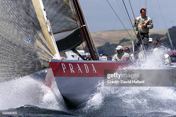 Prada surges through the choppy conditions against AmericaOne in the fifth race of the Louis Vuitton final on the Hauraki Gulf, Auckland, Tuesday....