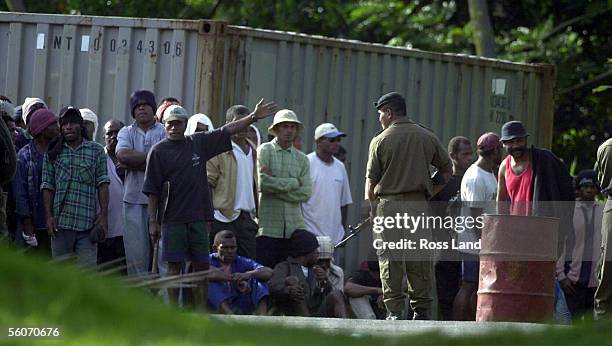 Supporters of self appopointed Fijian PM George Speight, play touch rugby in the grounds of paliament, on day 14 of the coup. Martial law was imposed...