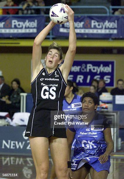 Silver Ferns Irene van Dyk takes a pass above Team Pacifika's Villimaina Davu during their Fisher and Paykel Cup match played at the ASB Stadium in...