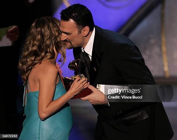 Singer Lina Luna accepts Best Latin Children's Album from Recording Academy Chairman Kike Santander onstage at the 6th Annual Latin Grammy Awards...