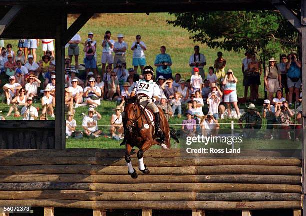 New Zealand's Blyth Tait and mount Chesterfield negotiate the water jump at the "Georgia International Horse Park" course during the team endurance...