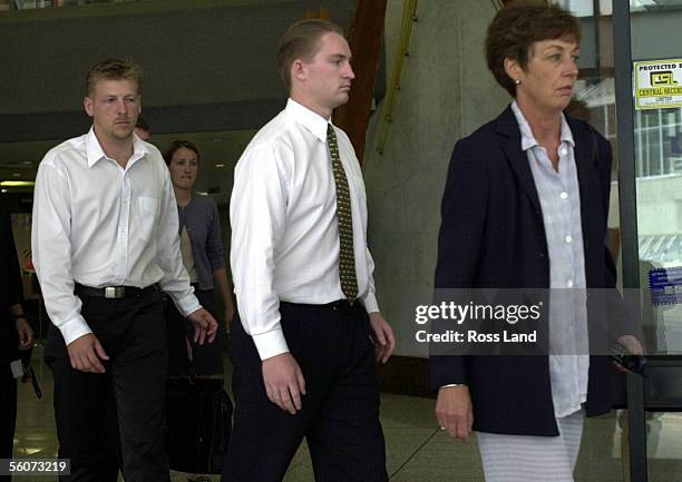 Matthew Schofield leaves the Auckland District Court with his supporters after facing two charges of manslaughter and causing bodily harm with...