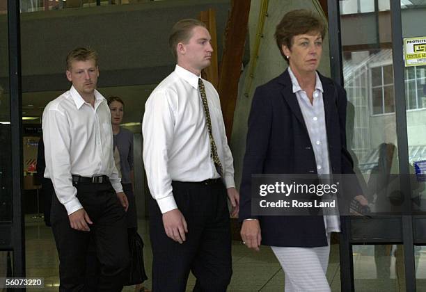 Matthew Schofield leaves the Auckland District Court with his supporters after facing two charges of manslaughter and causing bodily harm with...