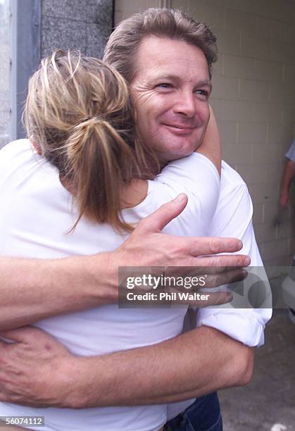 Mark Middleton is hugged by supporter Jessica McVicar as he walks free from the Auckland District Court after receiveing a 9 month suspended sentence...