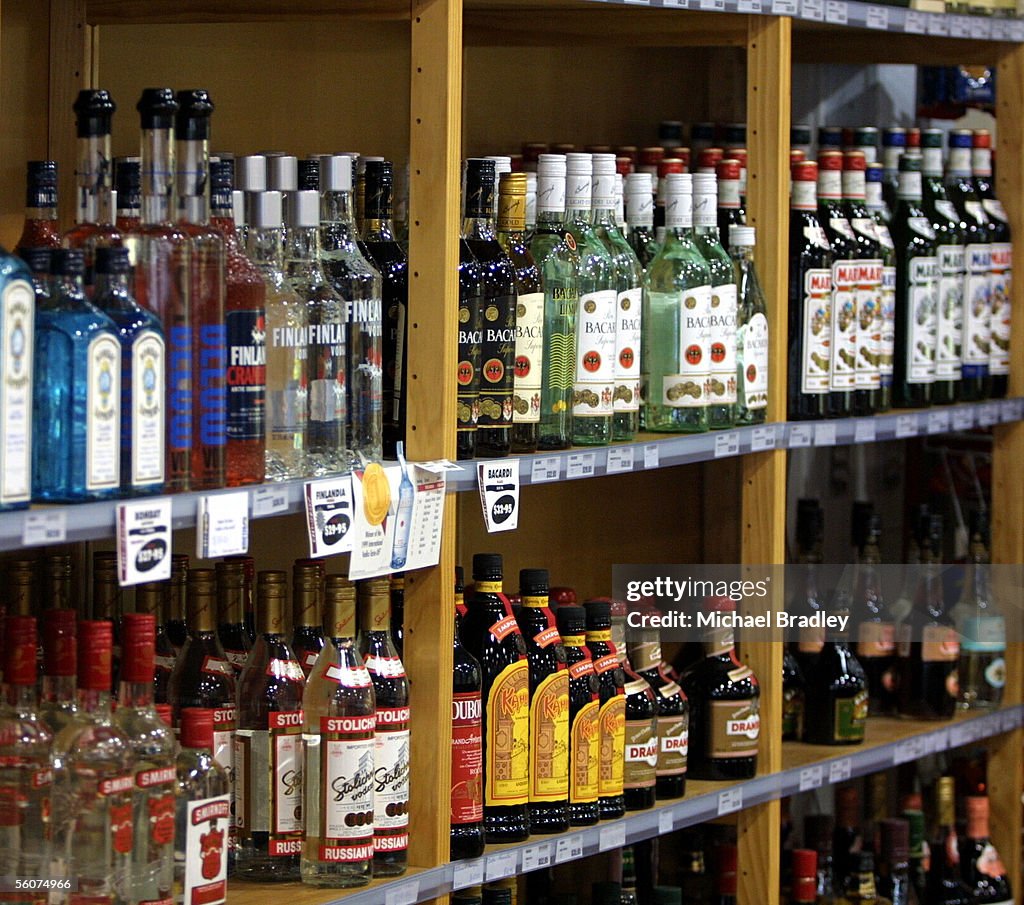 A line of spirits bottles at a local alcohol shop.
