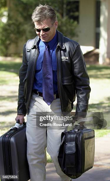 John Tippett, assistant to the Northern Territory Coroner, arrives at the Tennant Creek Court House for the inquest into the mysterious death of...