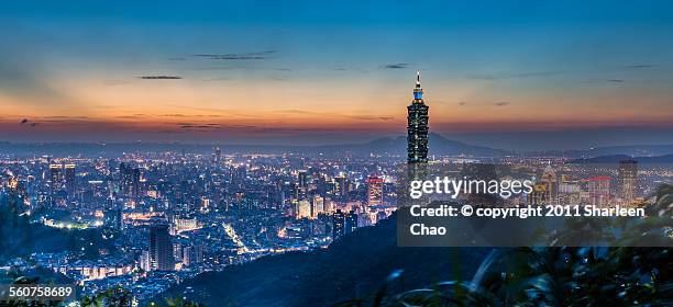 sunset glow pano - taipei 101 stock-fotos und bilder