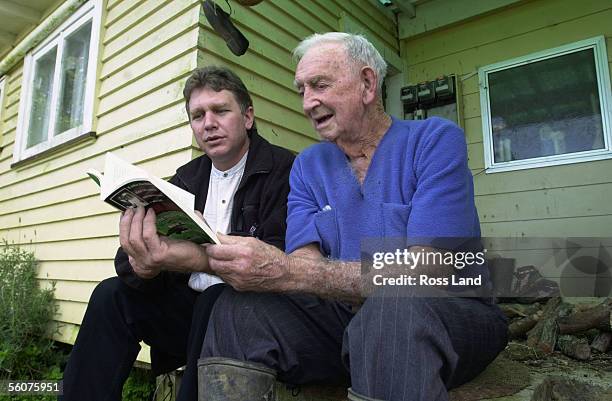 Former journalist Chris Birt shows 93yr old Allan Thomas, father of Arthur Allan Thomas, the fruits of 25 years work, his book "The Final Chapter",...