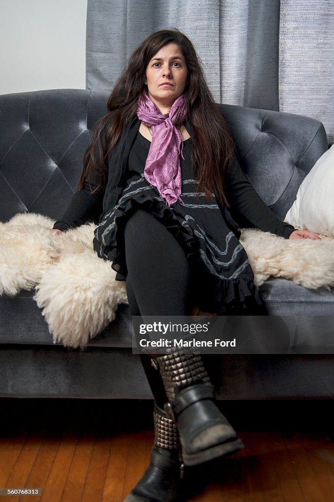 Woman sitting on sofa