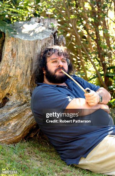 Peter Jackson, New Zealand director of The Lord of the Rings trilogy poses in the grounds of his Wingnut Films office in Wellington New Zealand with...