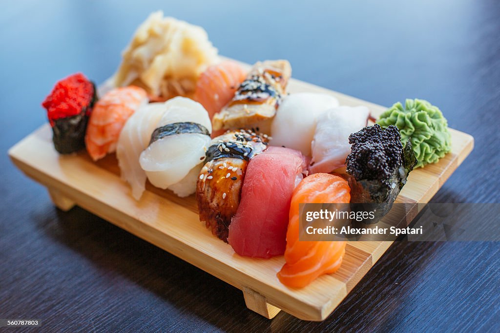 Close-up of sushi set on wooden board