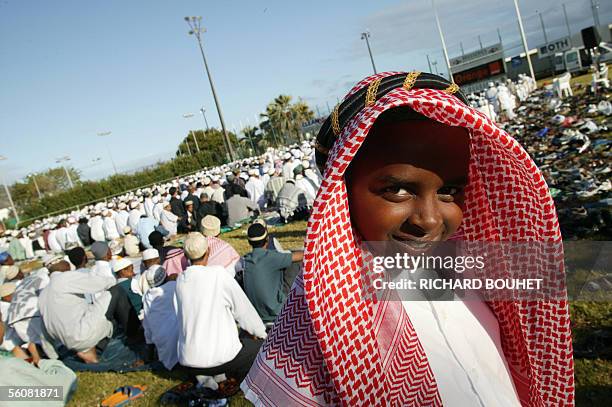 Saint-Denis de la Reunion, REUNION: Some 200 Muslims pray in the Champ Fleuri stadium on the French Indian Ocean island of Reunion, 04 November 2005,...