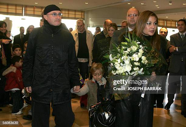 Phil Collins , his wife Orianne and son Nicholas arrive 04 November 2005 in the Movenpick hotel in Beirut. Collins will hold one night concert,...