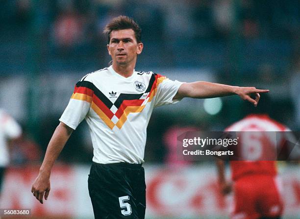 Klaus Augenthaler of Germany gestures during the World Cup group D match between United Arab Emirates and Germany at the Guiseppe Meazza Stadium on...