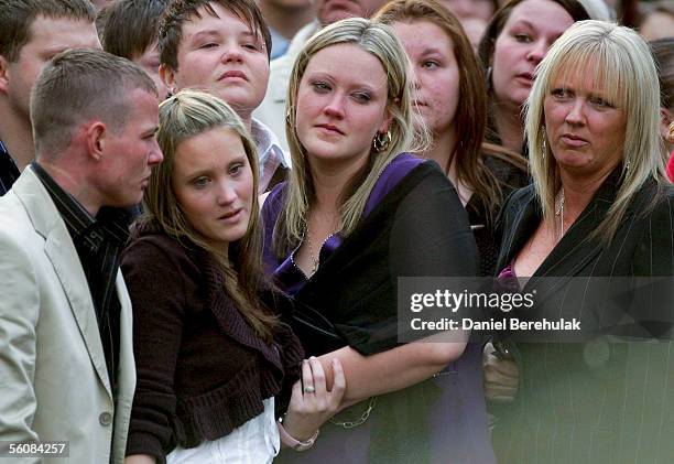 Sisters Michelle and Danielle with Linda Chiddy, mother of murdered model Sally Anne Bowman, seen at the end of service at as doves are released in...