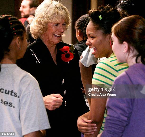 Camilla, Duchess of Cornwall greets people at a Shakespeare workshop during a visit to the Folger Shakespeare Library November 4, 2005 in Washington,...