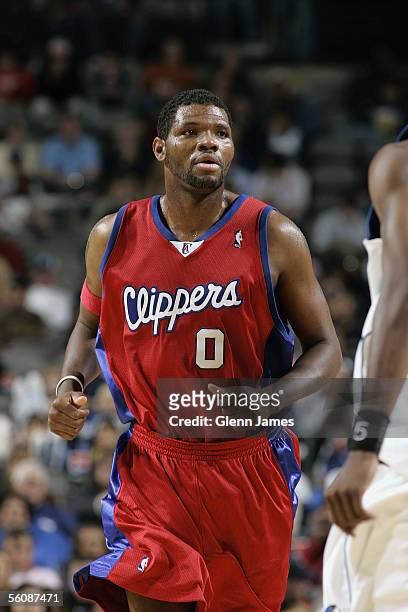 Walter McCarty of the Los Angeles Clippers runs upcourt during the preseason game against the Dallas Mavericks at American Airlines Arena on October...