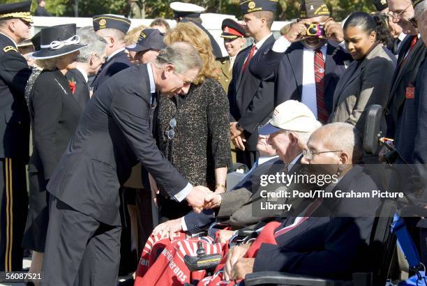 Prince Charles , Prince of Wales and Camilla , Duchess of Cornwall, visit a World War II Memorial and meet veterans on November 4, 2005 in...