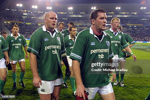 Members of the Ireland team leave the field lead by Anthony Foley and John Hayes after the second rugby test match between the All Blacks and Ireland...