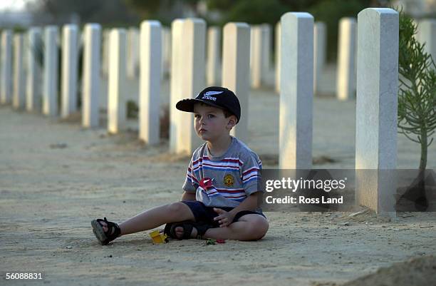 Four year old Ryan Buist, Son of Major Mike Buist, 2nd in command, Multi National Observer Force, Sinaia, plays wiith his toy cars in the New Zealand...