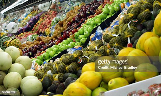 Various fruit and vegetables on the shelves at a local supermarket.
