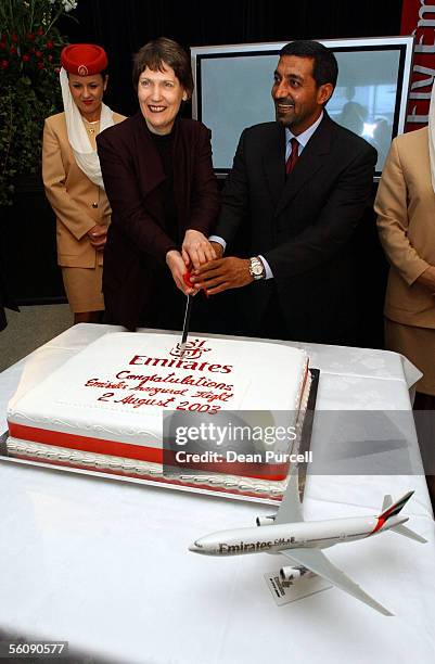 Emirates Chairman, HH Sheikh Ahmed bin Saeed AlMaktoum and Prime Minister of NZ, Helen Clark cut the cake after the Emirates inaugural flight touches...