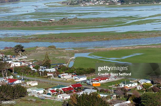 The swollen Rangitikei River, flows past Scotts Ferry, in the Manawatu, New Zealand, Thursday, July 01, 2004. The area was flooded extensively...