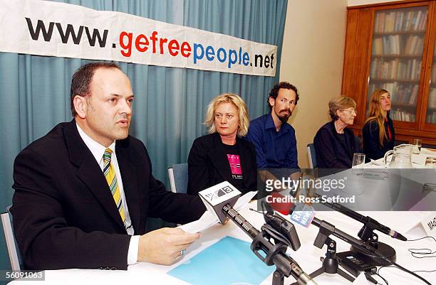 Greg Menendez, left, Take 5, addresses a press conference in Wellington Wednesday to continue the fight against GE, with Alannah Currie, Madge, Steve...