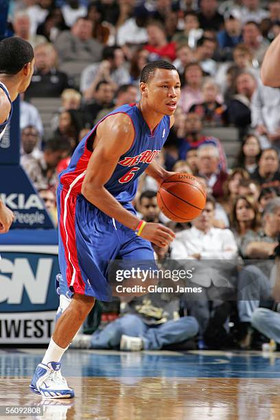 Alex Acker of the Detroit Pistons brings the ball upcourt during the preseason game against the Dallas Mavericks at American Airlines Arena on...