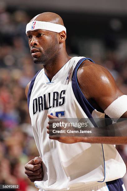 Erick Dampier of the Dallas Mavericks heads to the bench during the preseason game against the Detroit Pistons at American Airlines Arena on October...