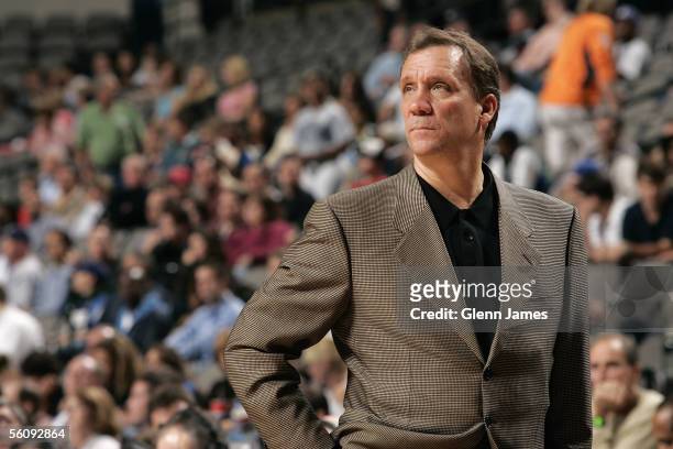 Head coach Flip Saunders of the Detroit Pistons looks to the court during the preseason game against the Dallas Mavericks at American Airlines Arena...