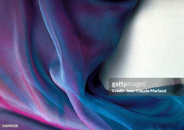 iridescent fabric - purple fabric stock pictures, royalty-free photos & images