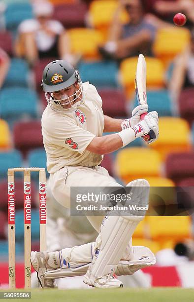 Michael Hussey of Australia avoids a bouncer during day three of the 1st Test between Australia and the West Indies at the Gabba on November 5, 2005...