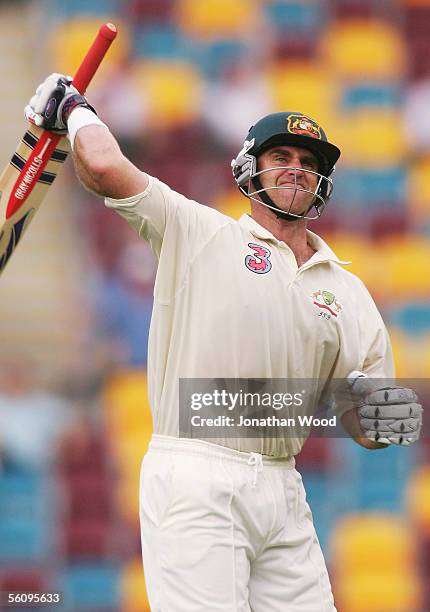 Matthew Hayden of Australia celebrates reaching his century during day three of the 1st Test between Australia and the West Indies at the Gabba on...