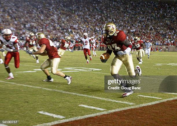 Linebacker Lawrence Timmons of the Florida State Seminoles returns the second consecutive blocked punt in the fourth quarter against the North...