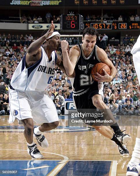 Manu Ginobili of the San Antonio Spurs drives to the basket against Marquis Daniels of the Dallas Mavericks on November 5, 2005 at the American...