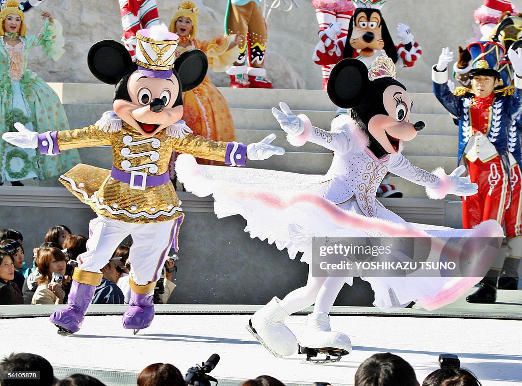 Disney characters Mickey (L) and Minnie