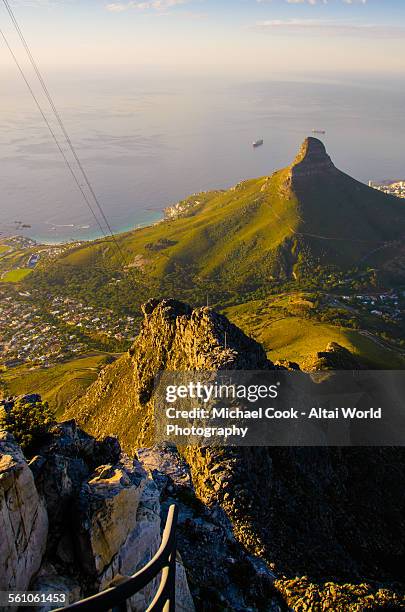 view of lions head mountain from table mountain - lion's head mountain stock pictures, royalty-free photos & images