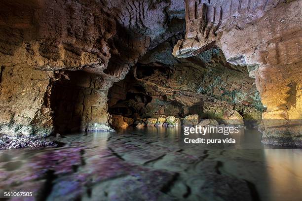 natural cave - denia stock pictures, royalty-free photos & images