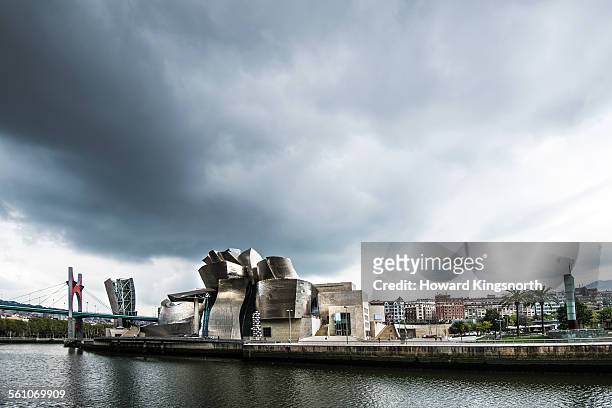 guggenheim museum and waterfront skyline - bilbao stock pictures, royalty-free photos & images