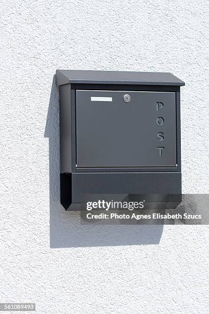 mailbox & newspaper holder box & shadow - domestic mailbox fotografías e imágenes de stock