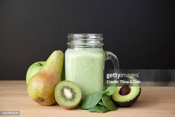 still life of fresh kiwi, pear and avocado smoothie - avocado smoothie stock pictures, royalty-free photos & images