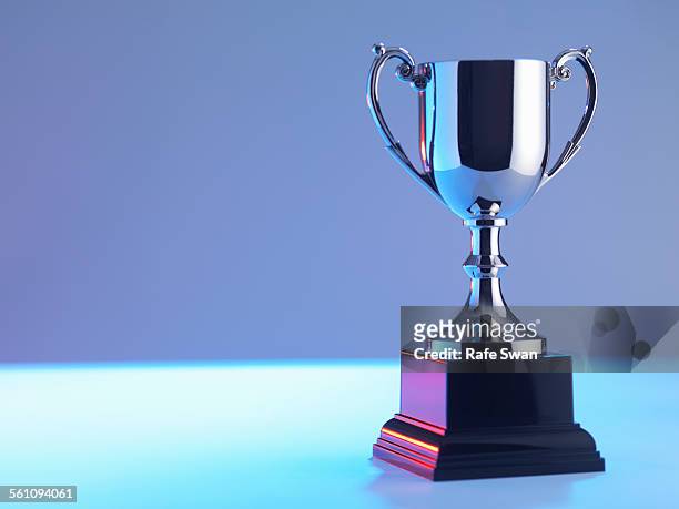 trophy at award ceremony - trophy award stock pictures, royalty-free photos & images