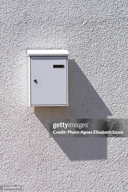 simple white mailbox & shadow - domestic mailbox stock pictures, royalty-free photos & images