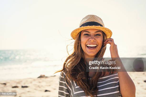 Woman posing on beach