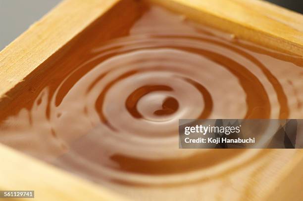 abstract concentric circles in liquid, close up - saké bildbanksfoton och bilder